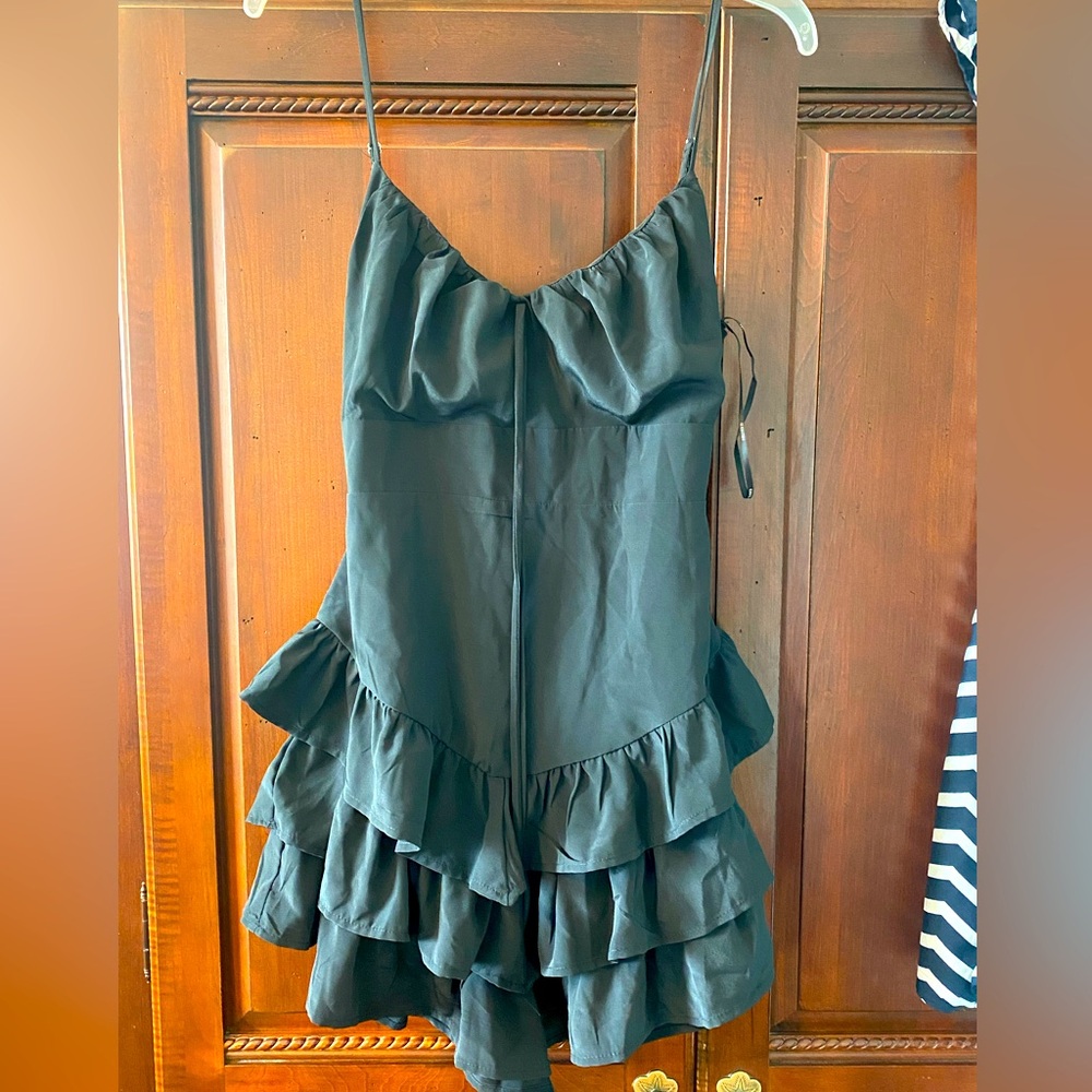 Spaghetti Strap Peekaboo Black Mini dress.
